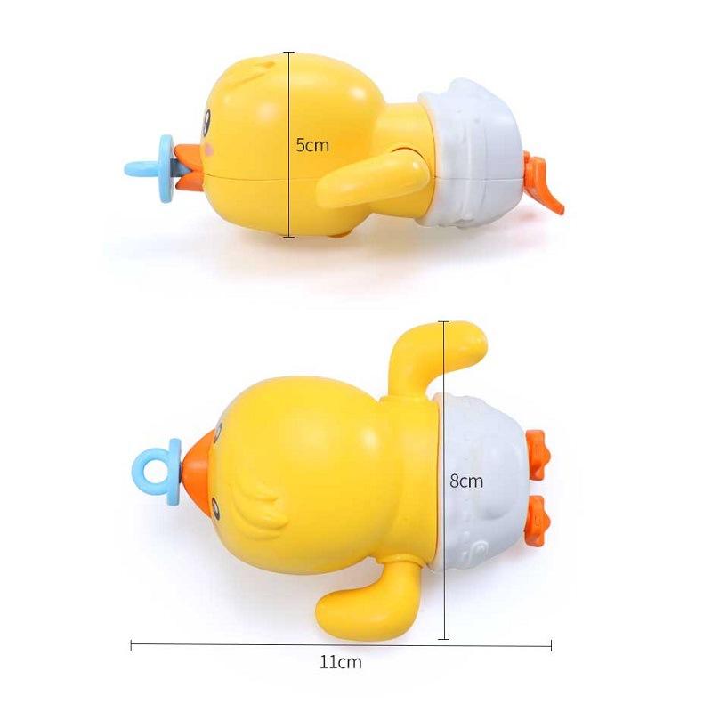 Yellow duck toy with measurements on a white background