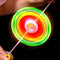 A colorful spinning yo-yo with concentric rings of green, yellow, orange, and red, photographed in motion against a black background with hands holding the string.