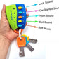 A hand holds a colorful smart remote key finder with attached keys. The remote is lime green and blue with yellow and cyan buttons, and the image includes callout lines labeling different sound functions: lock sound, car started sound, horn sound, bell sound, and soft music.