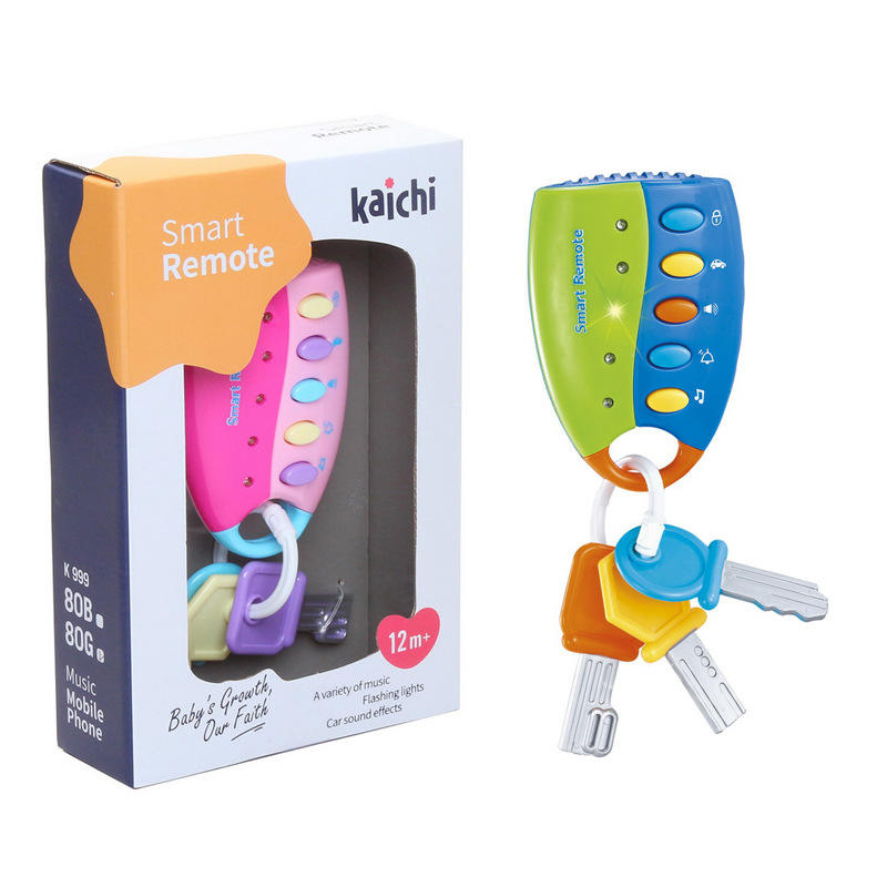 Kaichi Smart Remote car music player toy shown next to its retail packaging box on a white background. The remote has a split green and blue body with colorful buttons, attached to a keyring with keys.