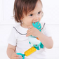 Baby Playing with a Hanging Dinosaur Teether Toy