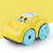 Yellow toy car with blue wheels on a white surface against a yellow background